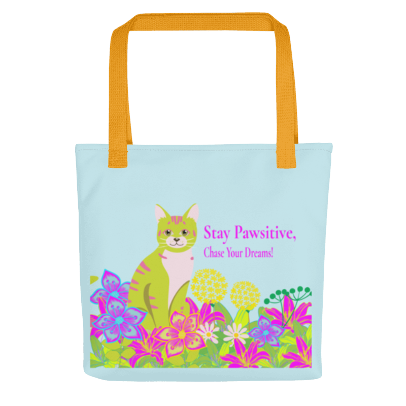 The Stay Pawsitive Tote Bag - front view with Pepita cat and colorful flowers